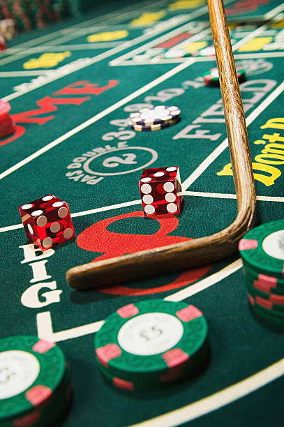 Roulette table with spinning wheel during live broadcast session